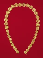 Necklace of rosette shaped relief beads, from the Tholos Tomb at Dendra, c.1400 BC